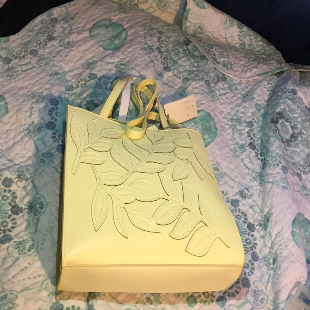 Yellow handbag with extra strap